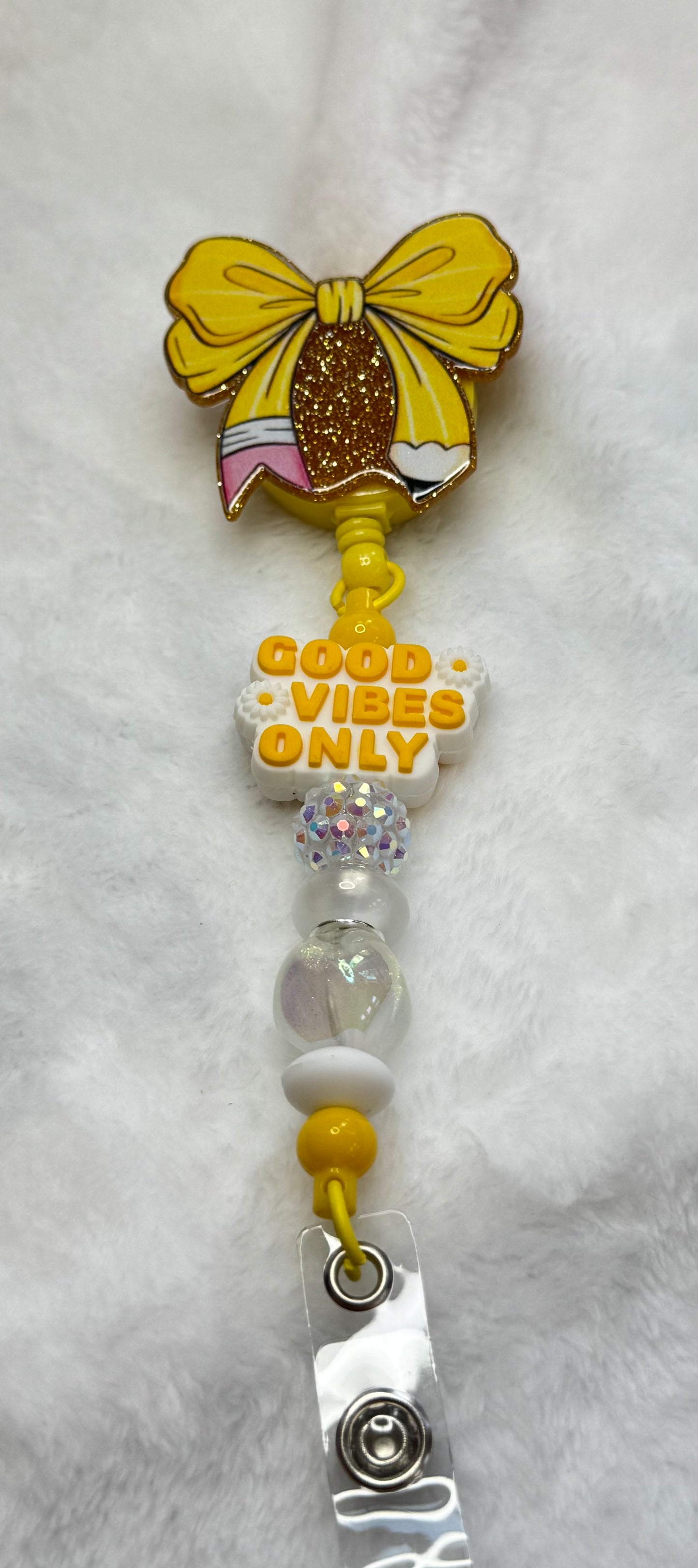 BR31 Yellow Pencil Bow Badge Reel