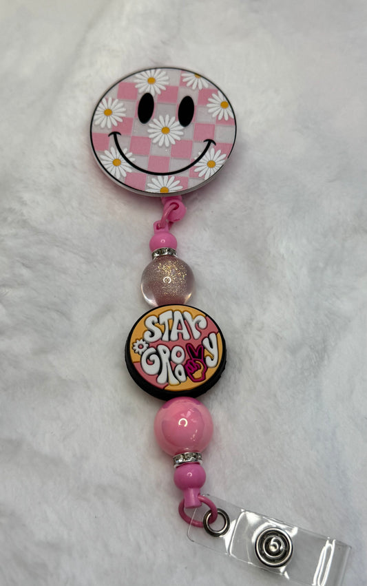 BR16 Smiley Face Daisy Badge Reel