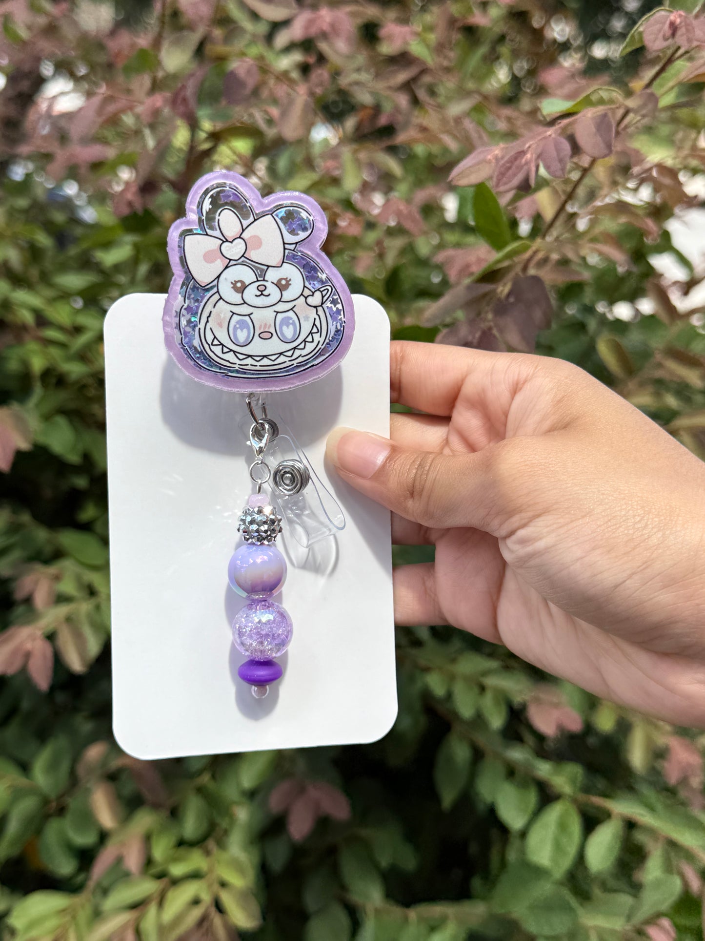 BR43 Purple Labubu Shaker Head Badge Reel