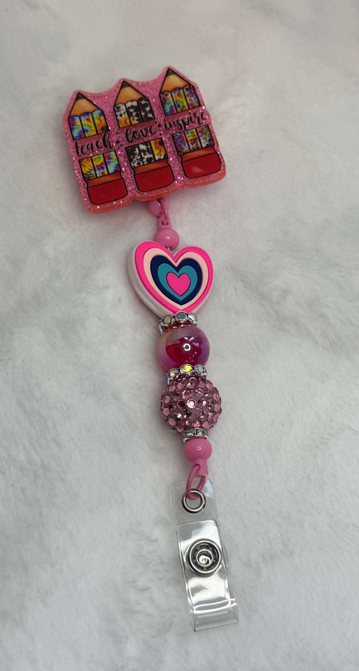 BR9 Teach, Love, Inspire Badge Reel